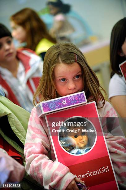 Mary Frances of Littleton waits to by a new doll named Lanie, during the grand opening of American Girl at Park Meadows, in Lone Tree, CO, March 27,...