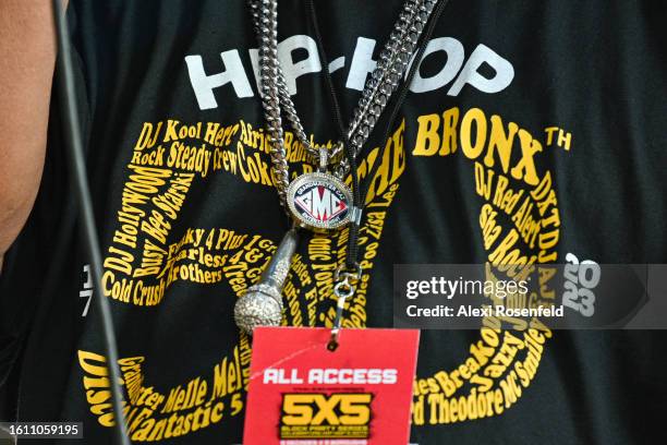 Detail of Grandmaster Caz's chains at the fiftieth anniversary of Hip Hop block party near 1520 Sedgwick Ave on August 12, 2023 in The Bronx borough...