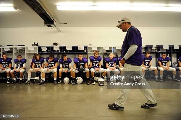The Wray Eagles head coach, Levi Kramer, paces the locker room giving an inspirational talk to his team before taking on the Burlington Cougars at...