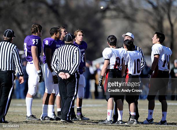 Coin toss between the Wray Eagles and the Burlington Cougars at the start of the the Colorado State 1A Championship football game Saturday afternoon,...