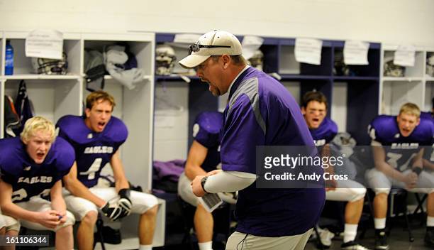 Wray Eagles head coach, Levi Kramer, fires up his players in the locker room just before taking the field against the Burlington Cougars for the...