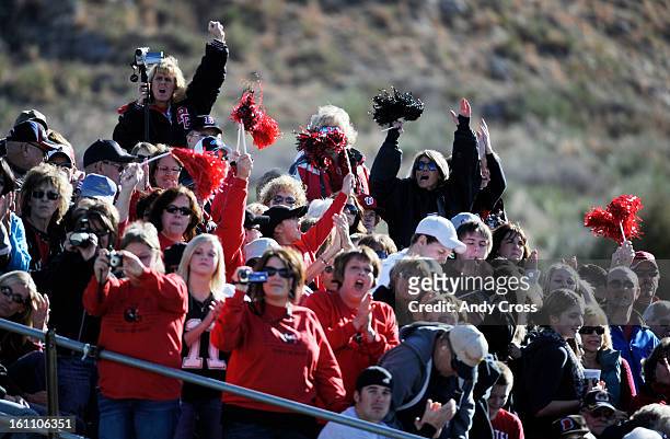 Burlington Cougars fans welcome their team to the field to play the Wray Eagles at the Colorado State 1A Championship football game Saturday...