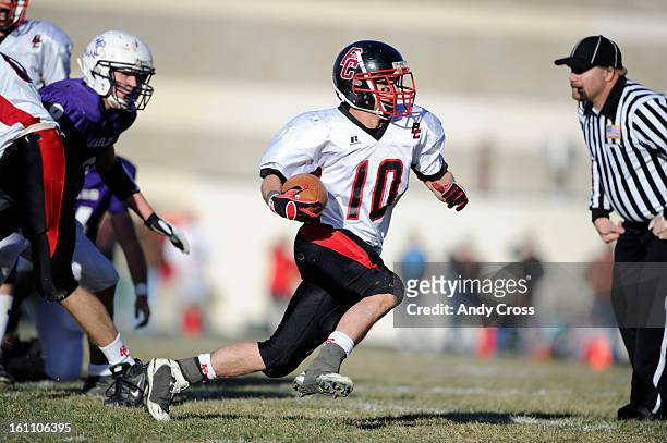 Burlington RB, Colin Eberhart, finds running room against the Wray Eagles during the Colorado State 1A Championship football game Saturday afternoon,...