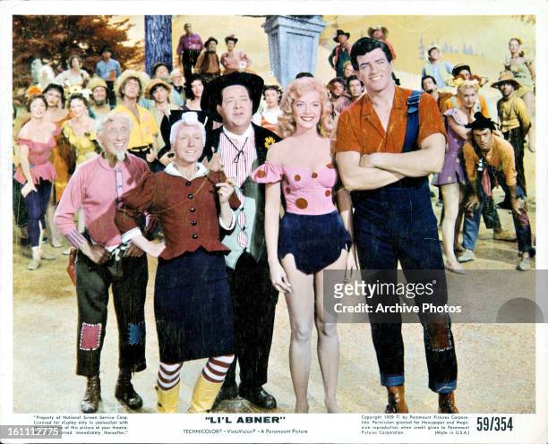 Stubby Kaye, Leslie Parrish and Peter Palmer in a scene from the film 'Li'l Abner', 1959.