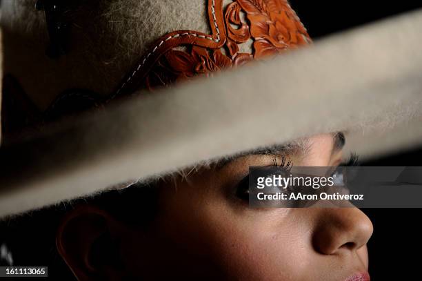 Gaby Padilla poses for a portrait during the Mexican Rodeo Extravaganza at the Denver Coliseum. The rodeo combines Mexican culture, traditions and...