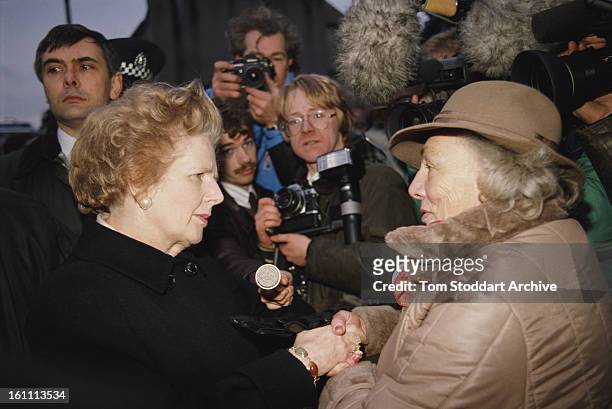 British Prime Minister Margaret Thatcher talks to local residents in the town of Lockerbie, Scotland, shortly after the bombing of Pan Am Flight 103,...
