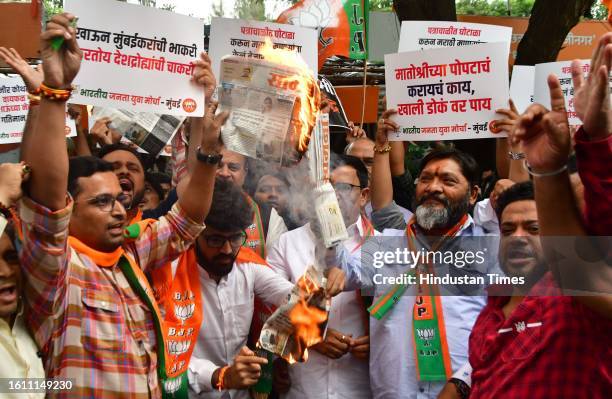 Bharatiya Janata Yuva Morcha activists protest against Shiv Sena mouthpiece Saamana and Uddhav Thackeray for using inappropriate abusive language, at...