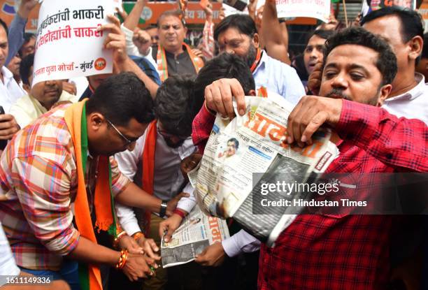 Bharatiya Janata Yuva Morcha activists protest against Shiv Sena mouthpiece Saamana and Uddhav Thackeray for using inappropriate abusive language, at...