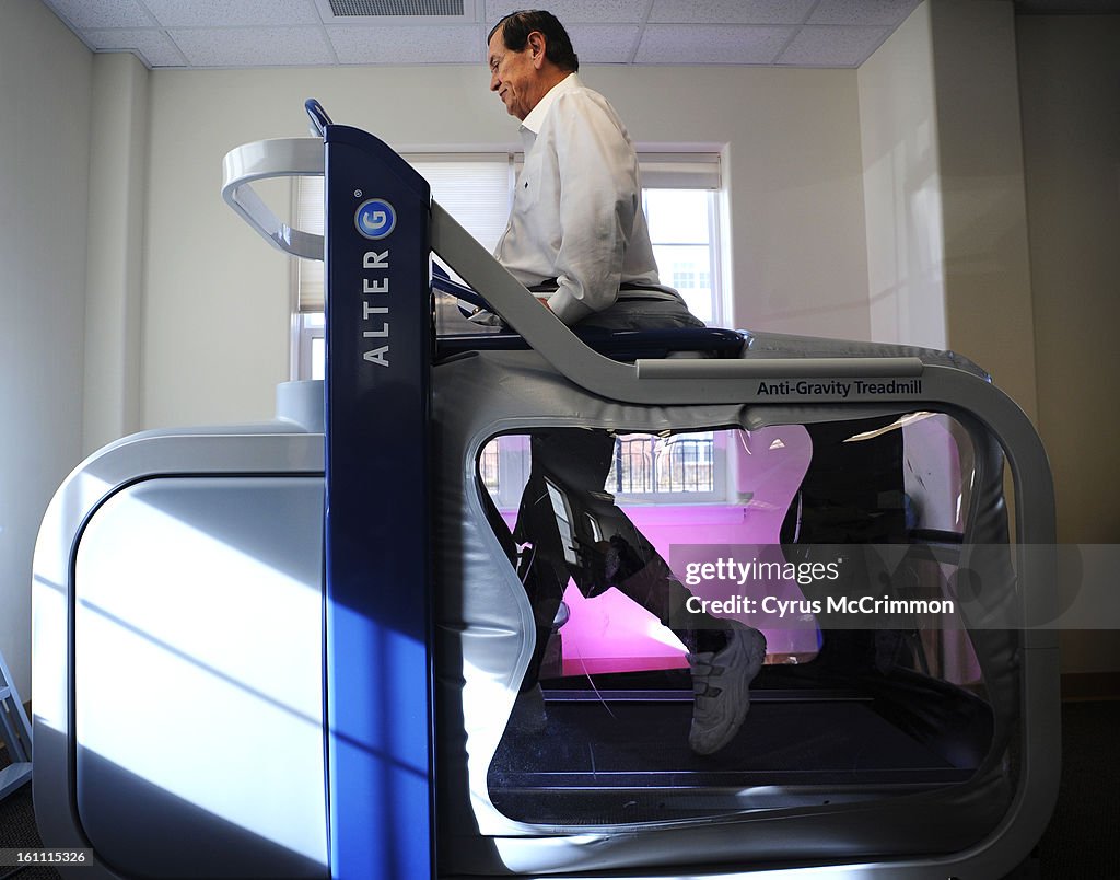 Bryan Moore, rehabs his injured legs on a Alter G , an anti-gravity treadmill , on Monday, December 27, 2010 at the rehabilition room at The Suites at Holly Creek in Centennial. Moore was sealed at the waist onto the treadmill creating a lower gravity env