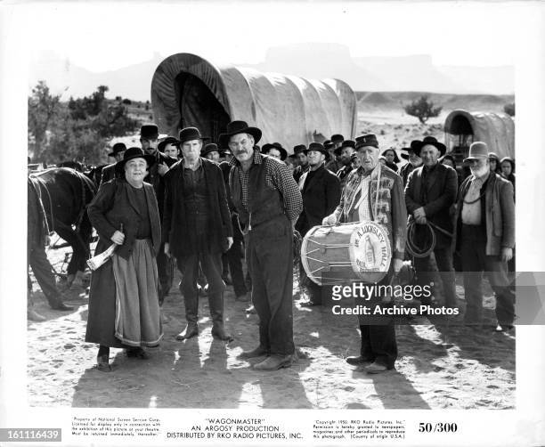 Jane Darwell, Harry Carey Jr, Ward Bond and others stop on the trail in a scene from the film 'Wagon Master', 1950.