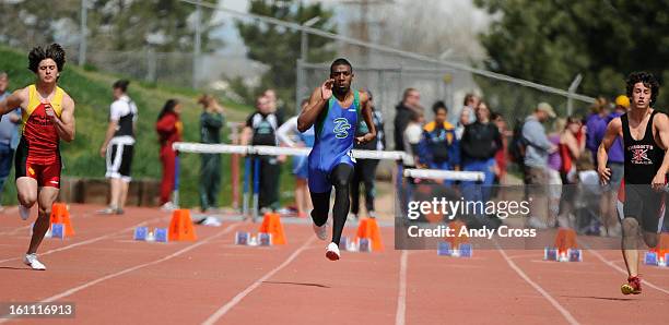 Kenneth Chambers, Doherty, center, during the boys 100 meter dash at the 2010 Liberty Bell high school track meet at the Littleton Public Schools...