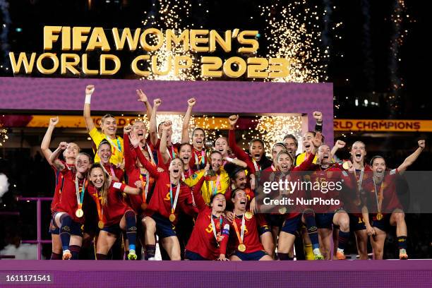 Spain celebrates with the trophy after winning during the FIFA Women's World Cup Australia &amp; New Zealand 2023 Final match between Spain and...