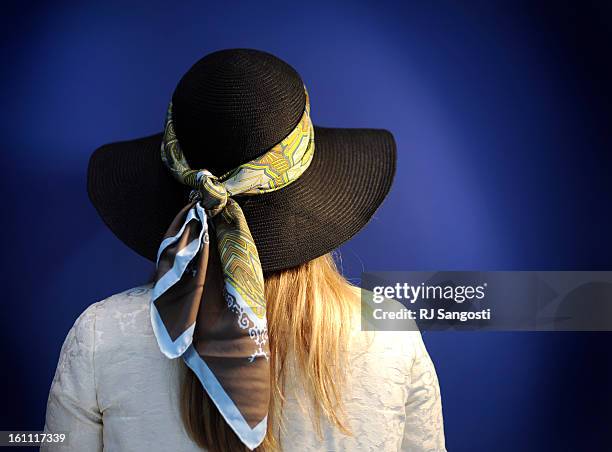 HATS05Sarah Morse shows off her hat at the annual Luncheon by Design at the Denver Art Museum in Ponti Hall. RJ Sangosti/ The Denver Post