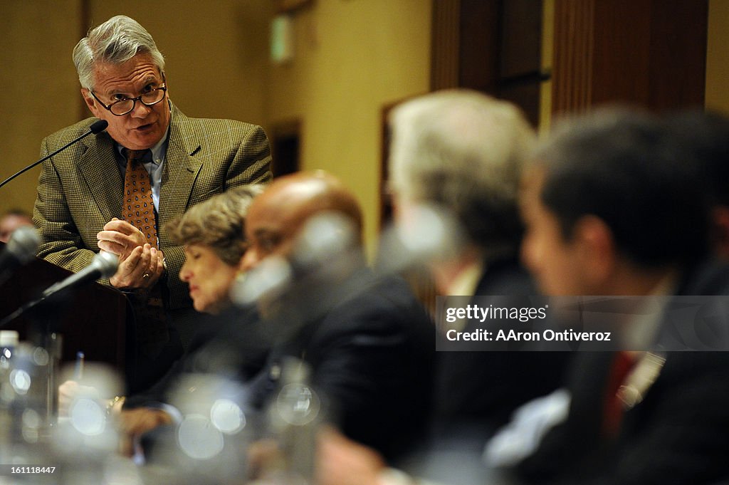 Moderator Floyd Ciruli asks a question to candidates during a mayoral forum at the Denver Athletic Club on Wednesday, March 2, 2011. AAron Ontiveroz, The Denver Post