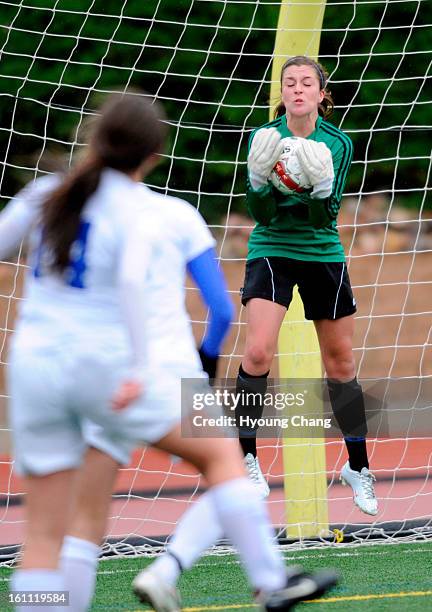 Cherry Creek's goalie Renee Standage saves the goal from Douglas County's pffense at Stuttler Bowl on Friday. Cherry Creek won 3-1. Hyoung Chang/ The...