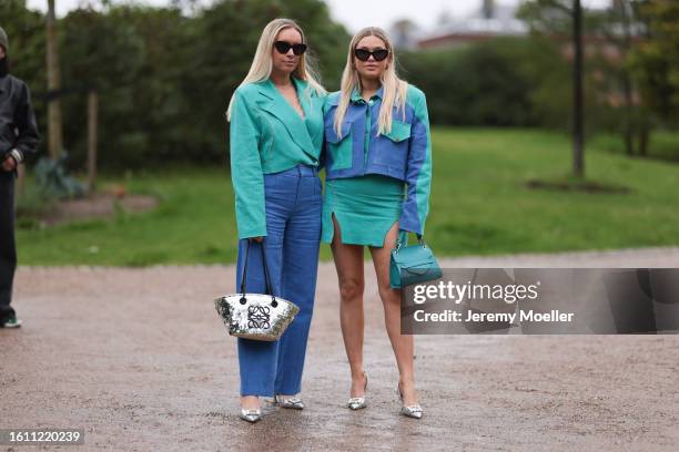 Guest is seen wearing black sunnies, green cropped blazer, blue linen pants, silver shiny Loewe handbag, silver shiny heels, Guest is seen wearing...