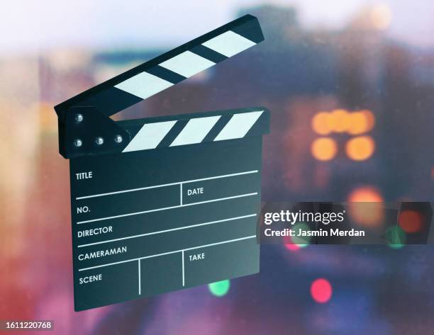 wooden movie clapperboard on movie set - filmfestival stock-fotos und bilder