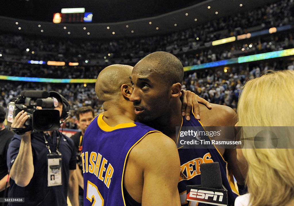 Los Angeles Lakers guard Derek Fisher #2, left, and teammate Kobe Bryant #24, right after defeating the Nuggets 103-97 in the final minuets of the fourth quarter of play in Game 3 of the Western Conference Finals best of seven series Saturday May, 23, 200