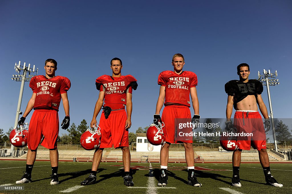 Regis High School football players are from left to right Casey Young
