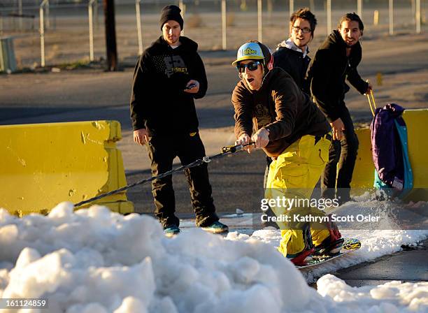 Pat Milbery is professional snowboarder who uses various ways to keep fit for his sport. Milbury and his friends make use of piles of snow that the...