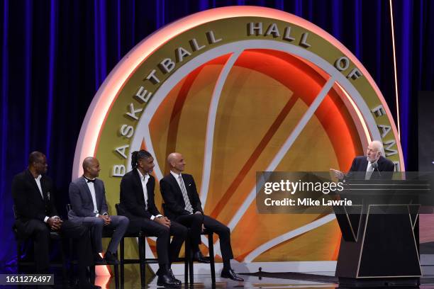 Hall of Fame members presenters David Robinson, Tony Parker, Tim Duncan and Manu Ginobili look on as inductee Gregg Popovich speaks during the 2023...