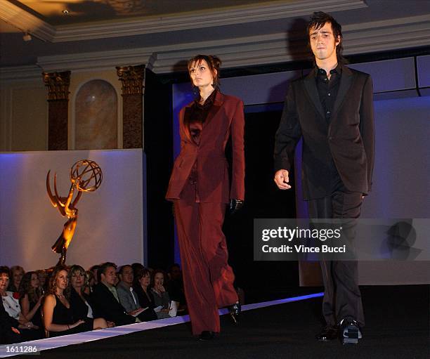 Models wearing clothing designs by Jil Sander and Badgley Mischka at the Academy of Television Arts and Sciences "Fashion Night With Emmy" fashion...