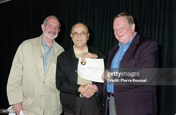 American Film Maker Brian De Palma joins World Film Festival''s President Serge Losique who is presenting the Maurice Bessy award to Time Magazine...