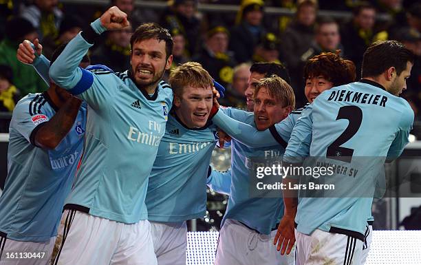 Artjoms Rudnevs of Hamburg celebrates after scoring his teams third goal during the Bundesliga match between Borussia Dortmund and Hamburger SV at...