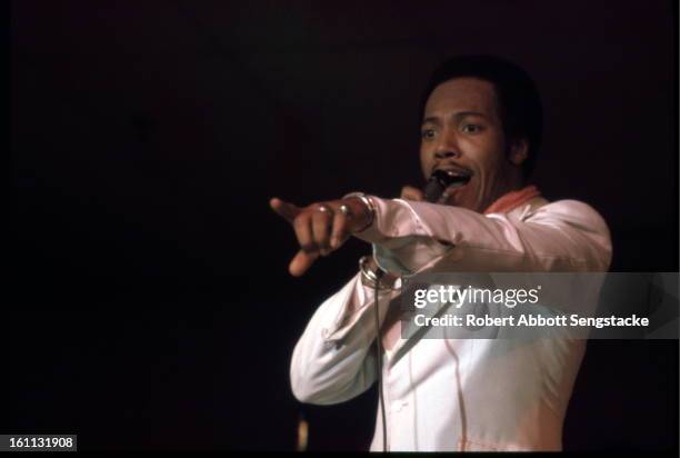 American R&B and pop musician Lamont McLemore, lead singer of the group the 5th Dimension, performs onstage, 1970s.