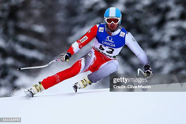 Michal Klusak of Poland skis in the Men's Downhill during the Alpine FIS Ski World Championships on February 9, 2013 in Schladming, Austria.