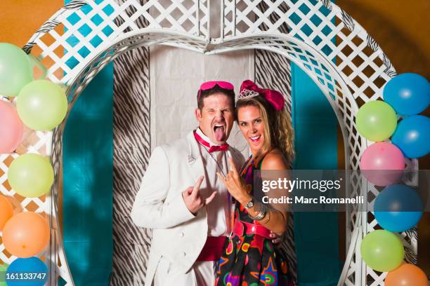 caucasian couple at retro prom - embarrassed girlfriend stock pictures, royalty-free photos & images