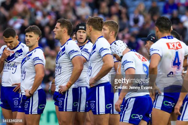Bulldogs look on after a Knights try during the round 24 NRL match between Newcastle Knights and Canterbury Bulldogs at McDonald Jones Stadium on...