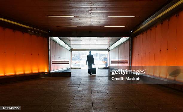 silhouette of a man - farewell colleague stock pictures, royalty-free photos & images