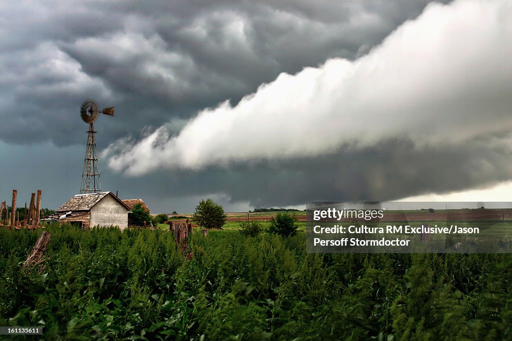 Clouds gathering over farm