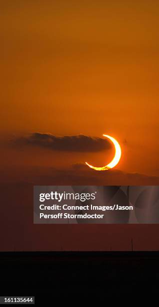 annular eclipse at sunset - solar eclipse stock pictures, royalty-free photos & images