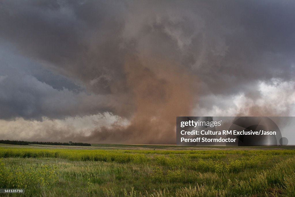 Storm clouds over rural landscape