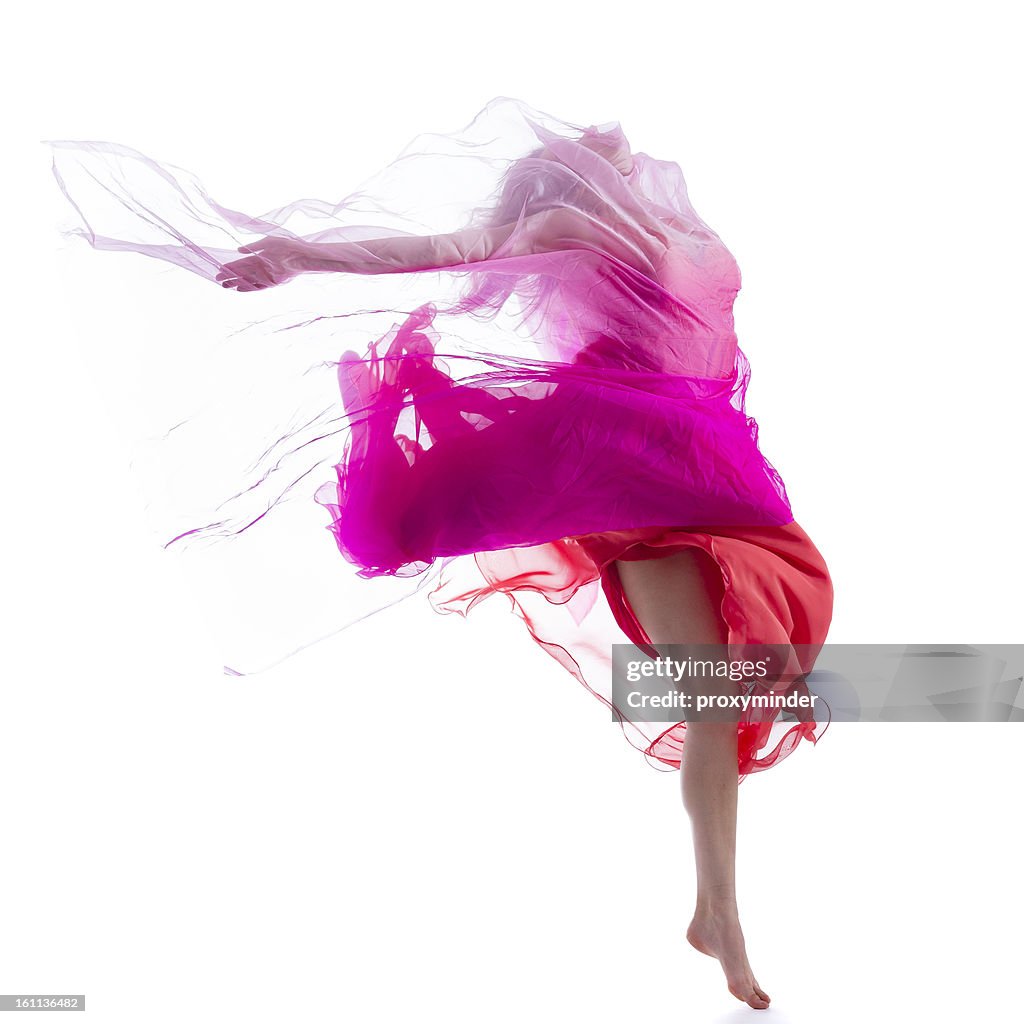 Dancer jump on white background with pink fabric