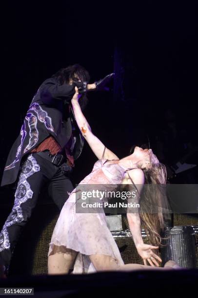 American heavy metal singer Alice Cooper and his daughter, actress and singer Calico Cooper, perform at the Sears Centre in Hoffman Estates,...