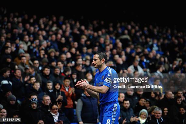 Frank Lampard of Chelsea applauds the fans during the Barclays Premier League match between Chelsea and Wigan Athletic at Stamford Bridge on February...