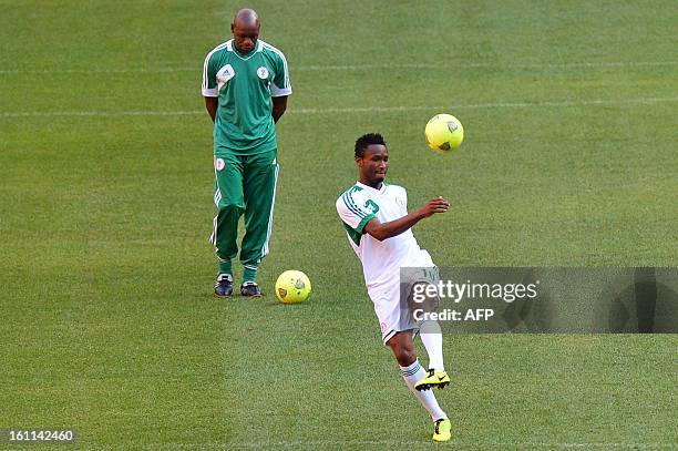 Nigeria's midfielder John Obi Mikel takes part in a training session at Soccer City in Soweto on February 9 on the eve of the 2013 Africa Cup of...
