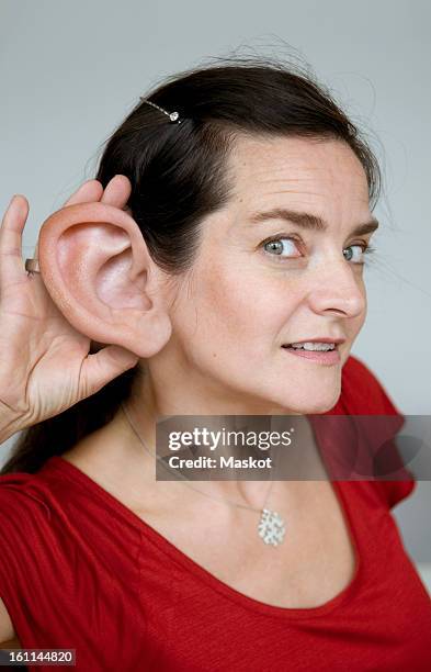 woman with big ear - ear stock pictures, royalty-free photos & images