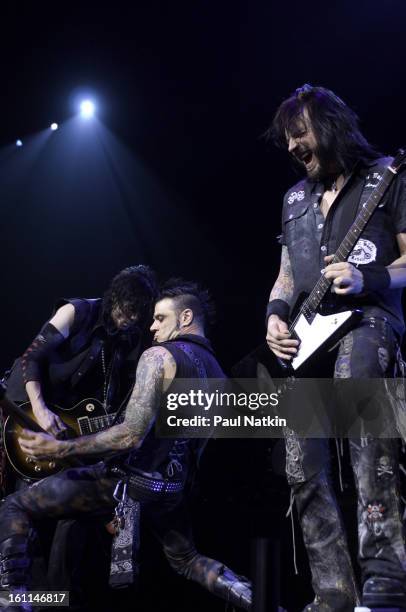 American heavy metal musicians, from left, guitarist Keri Kelli, bassist Chuck Garric, and guitarist Jason Hook perform with Alice Cooper at the...