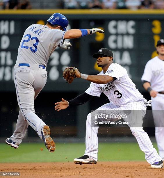 Colorado Rockies second baseman, Eric Young Jr., tags out Casey Blake, Los Angeles Dodgers, who got caught in a pickle play in the second inning at...