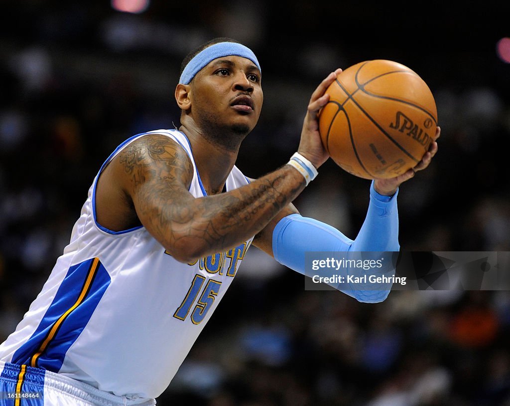 Denver Nuggets forward Carmelo Anthony (15) drained a series of free-throws late in the fourth quarter. The Denver Nuggets beat the Houston Rockets 111-101 at the Pepsi Center Wednesday night, December 16, 2009. Karl Gehring, The Denver Post