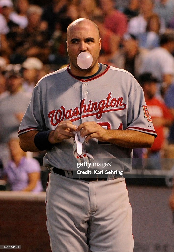 Nationals batter Nick Johnson blew a bubble after being stranded on first base in the eigth inning. The Colorado Rockies beat the Washington Nationals 1-0 at Coors Field Monday night, July 6, 2009. Jason Marquis got the win pitching eight innings while Hu