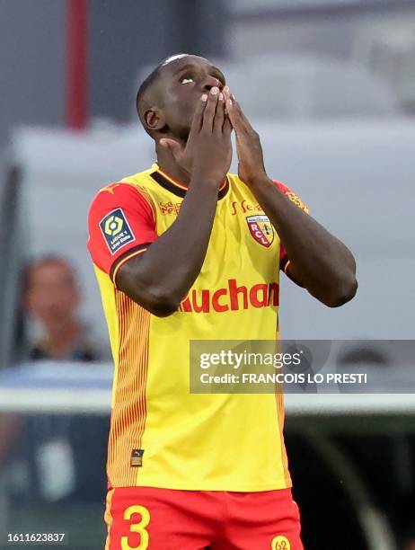 Lens' Colombian defender Deiver Machado celebrates after he scored a first goal for his team during the French L1 football match between RC Lens and...