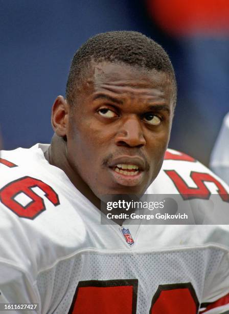 Ken Harvey of the Phoenix Cardinals looks on from the sideline during a game against the New York Giants at Giants Stadium on October 11, 1992 in...