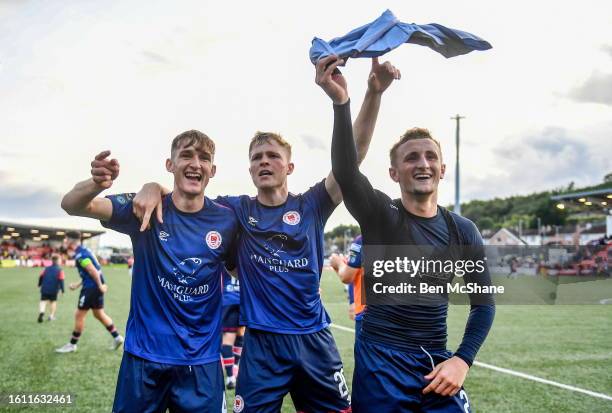 Derry , United Kingdom - 20 August 2023; St Patrick's Athletic players, from left, Mason Melia, Jay McGrath and Sam Curtis celebrate after the Sports...