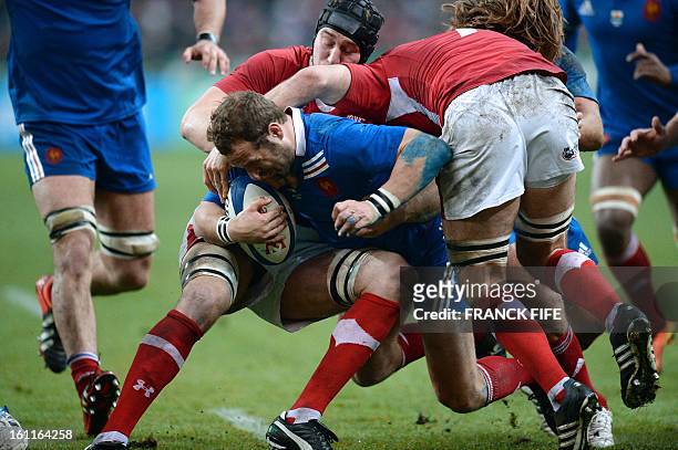 France's fly half Frederic Michalak vies with Wales' captain Ryan Jones during a Six Nations rugby union match between France and Wales on February...