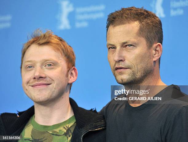 British actor Rupert Grint and German actor Til Schweiger pose during a photocall for the film "The Necessary Death of Charlie Countryman" competing...